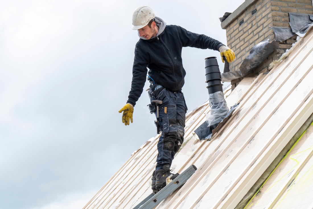 Man on a roof 